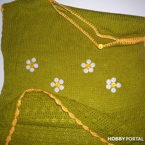   .   .Knitted baby dress. Author Elena Bas.
