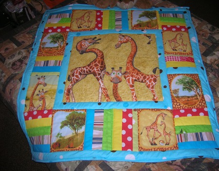Детское лоскутное одеяло в кроватку Жирафики ручной работы на заказ