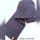 :      (knitting scarf)